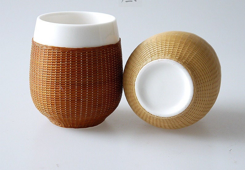 This is a bamboo woven teacup.this is a ceramic teacup