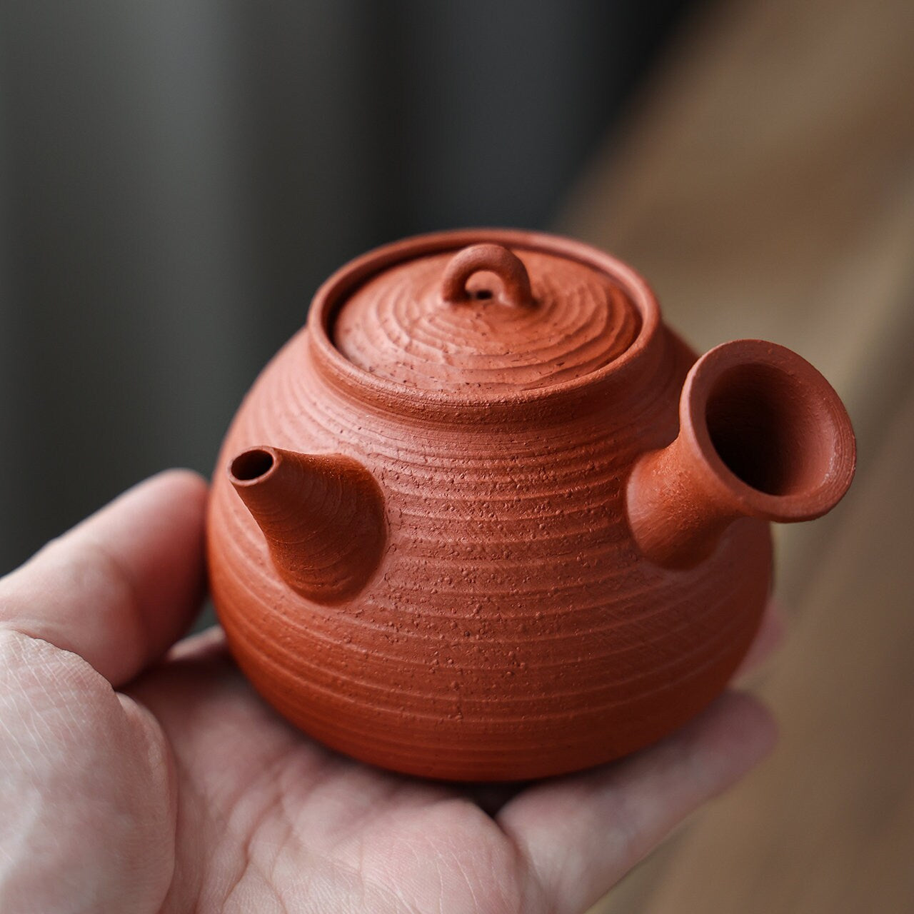 This is a Chaozhou side handle teapot.this is Chaozhou red clay zhuni teapot