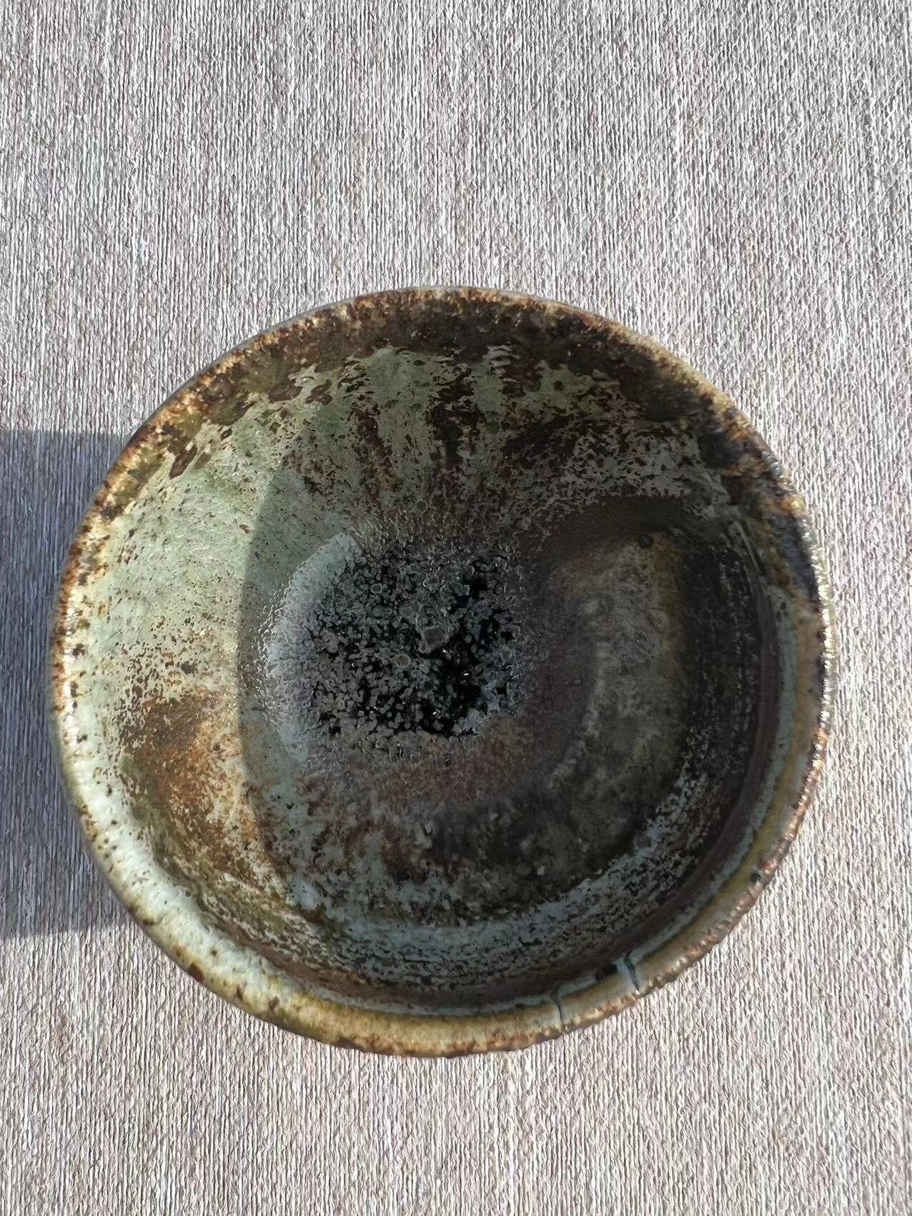 This is a woodfired pottery teacup