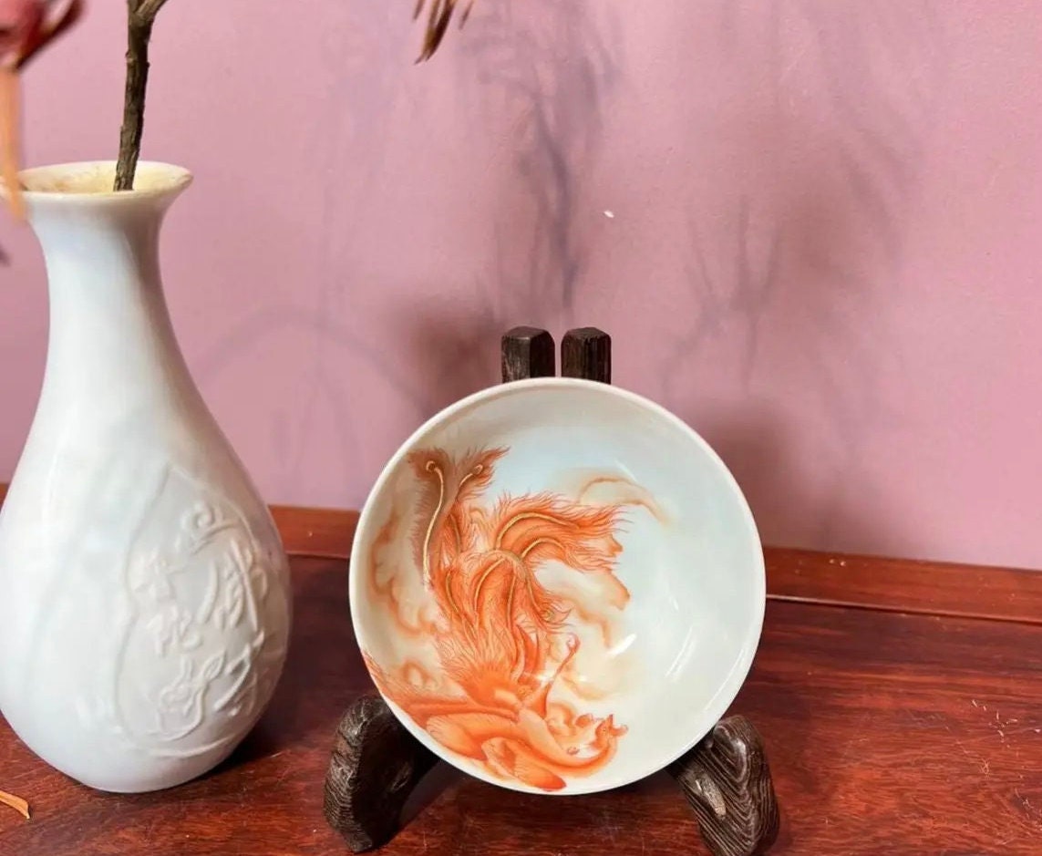 this is a Chinese Jingdezhen alum red phoenix teacup.this is a ceramic teacup