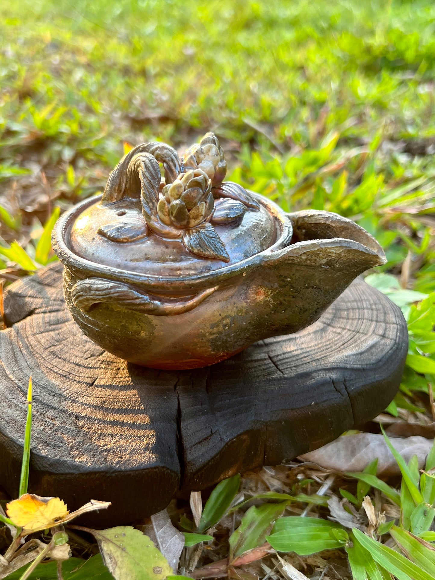 This is a pottery teapot