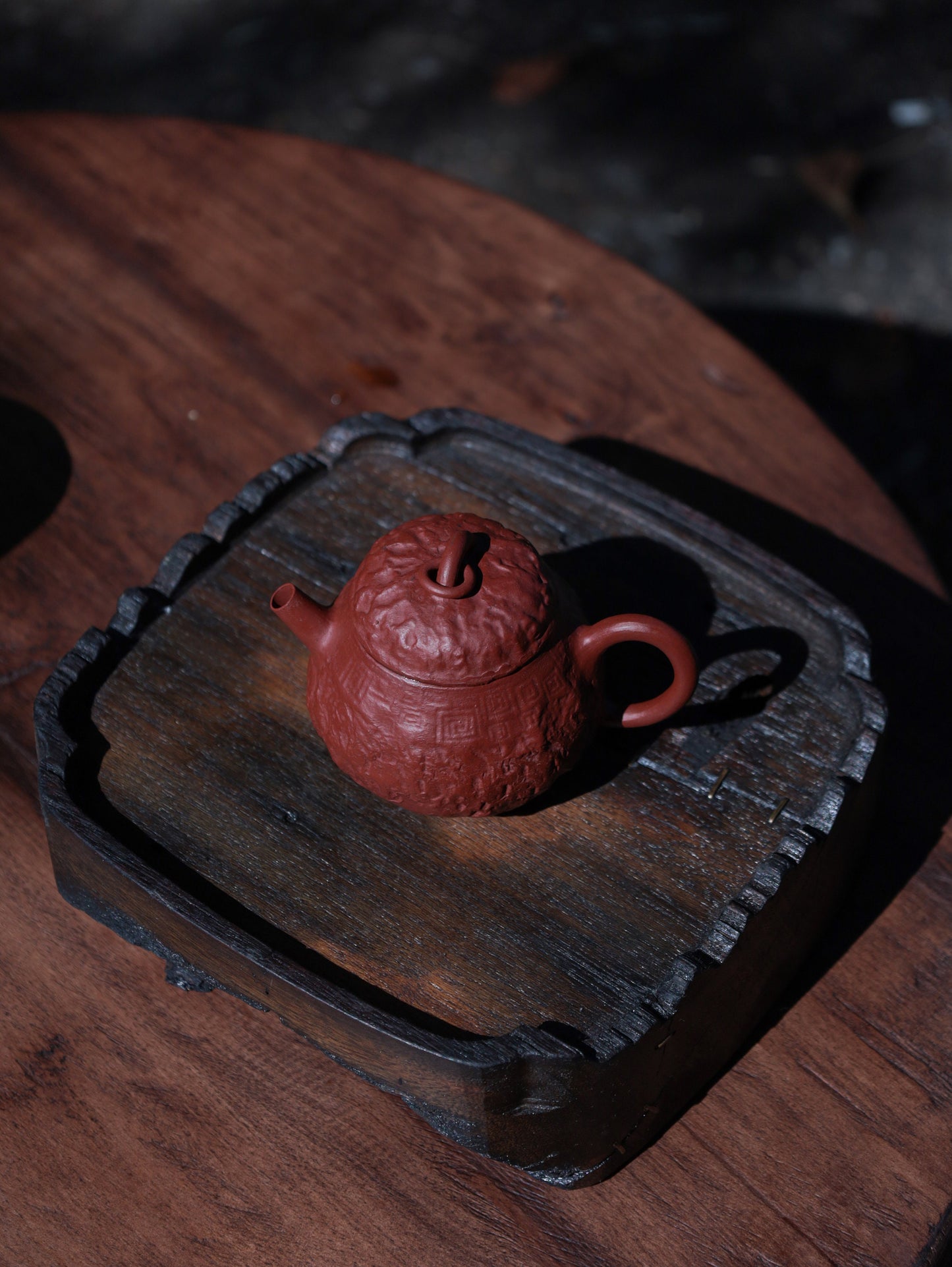 This is a purple clay teapot