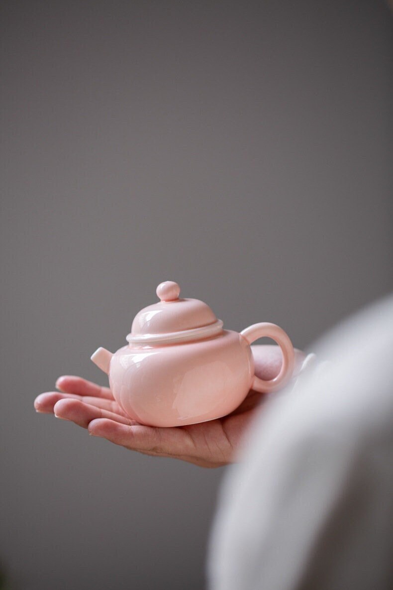 This is a ceramic teapot