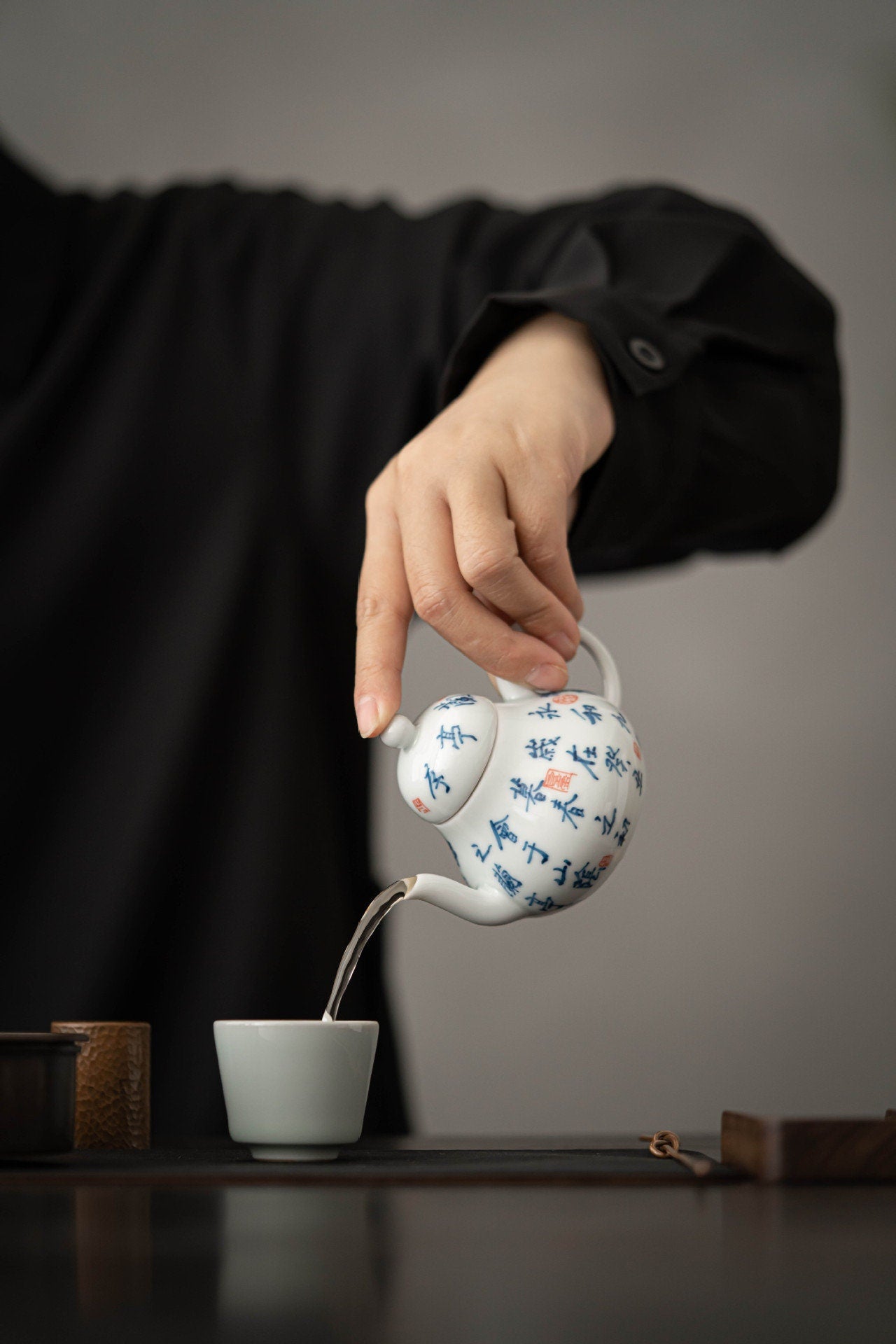 This is a white ceramic teapot