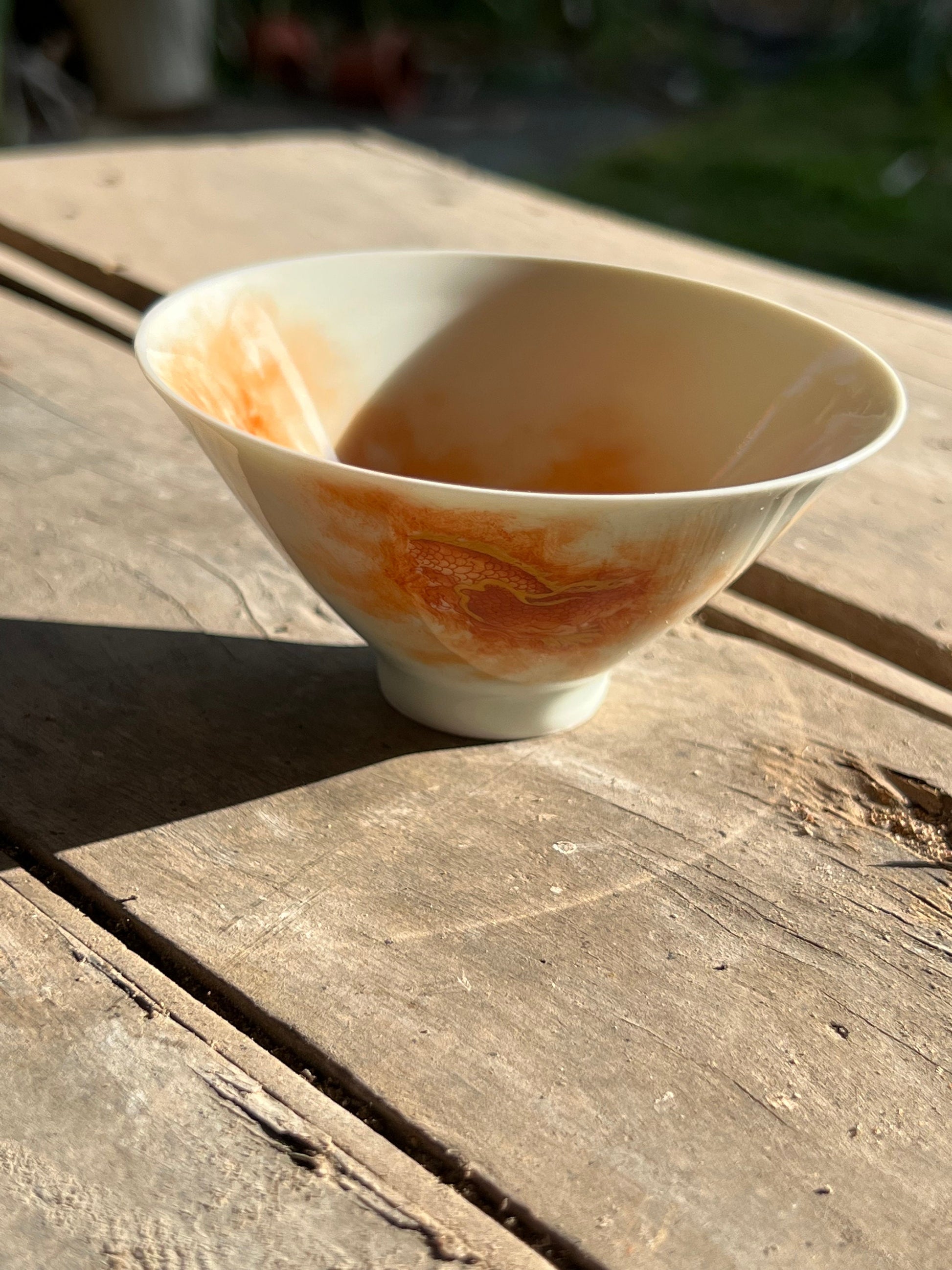 this is a Chinese Jingdezhen alum red dragon teacup.this is a ceramic teacup