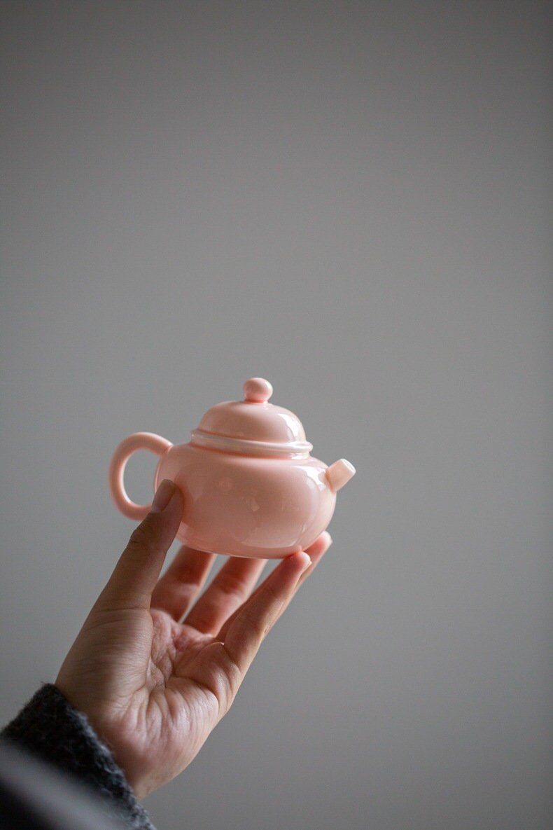 This is a ceramic teapot