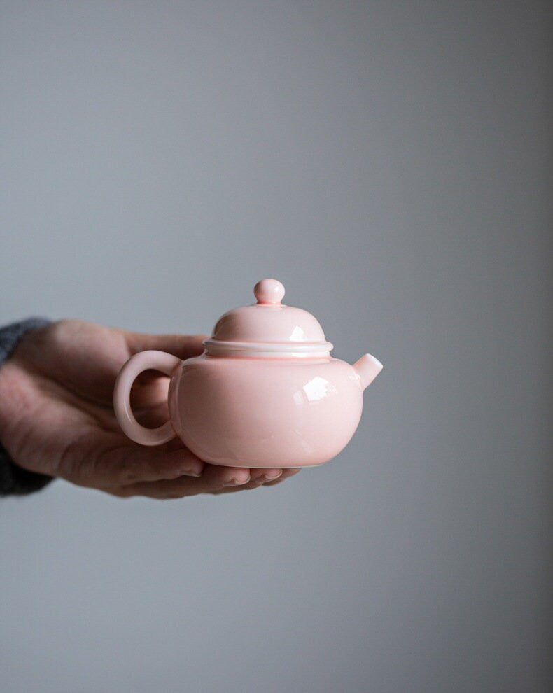 This is a ceramic teapot