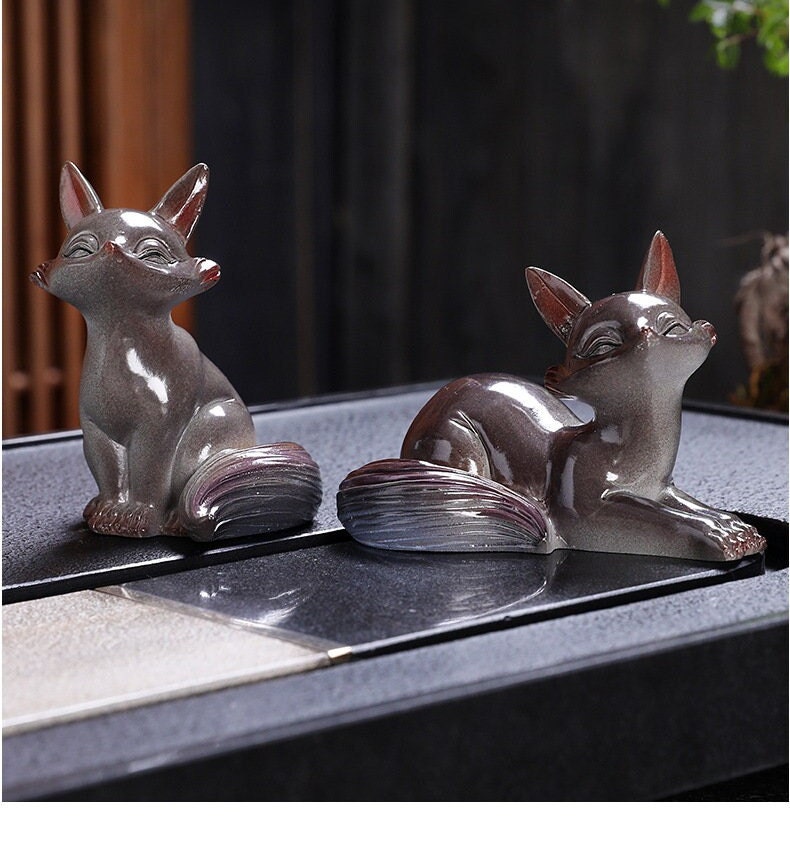 This is a color changing fox teapet.this is a resin teapet