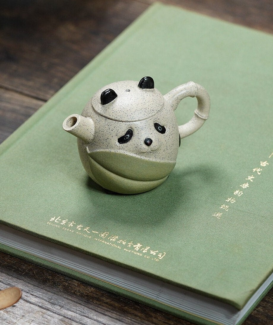 This is a pottery teapot