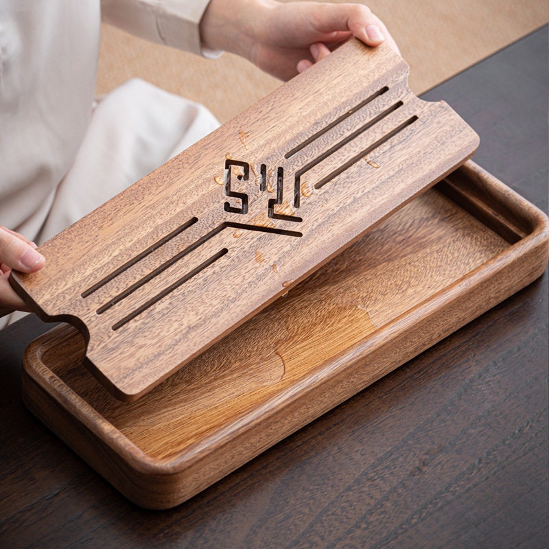 this is a walnut tea tray tea boat